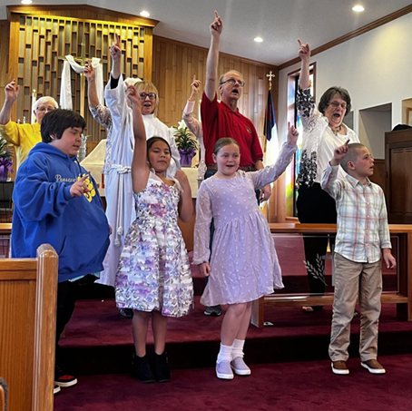 Children choir singing and dancing