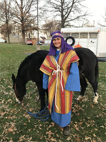 Woman with a donkey (Nativity)
